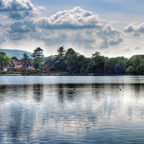 Petersfield Heath pictured under a cloudy sky.
